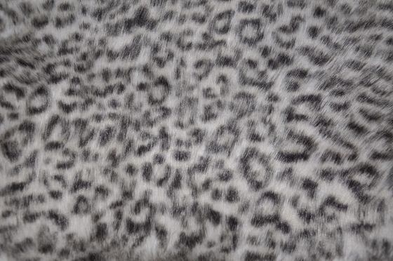Tessuto 100% poliestere con stampa leopardata, resistente alle pieghe, larghezza 150 cm
