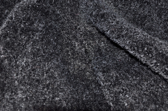 Il filo di ordito nero ha tricottato l'arricciatura guarda la larghezza di 150cm per l'indumento