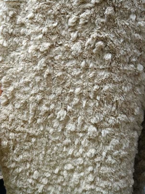 Tessuto a maglia in fiore a taglio cammello 610 gm